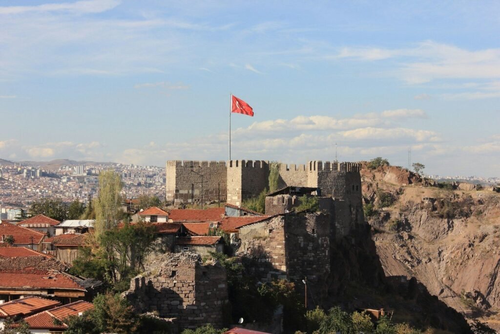 A castle with a flag on top of it