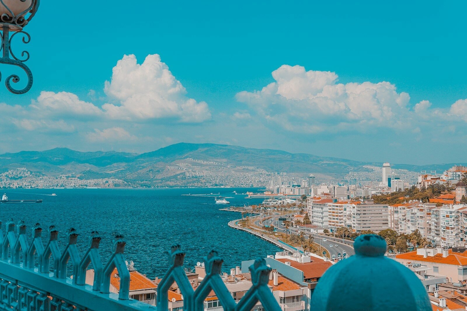 a view of a body of water with buildings in the background